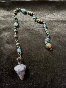 ocean calcite crystal pendulum with handmade chain